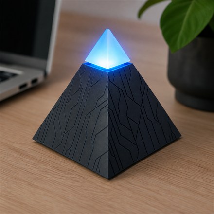 Autonomous Intern 2 glowing pyramid desktop AI agent close up