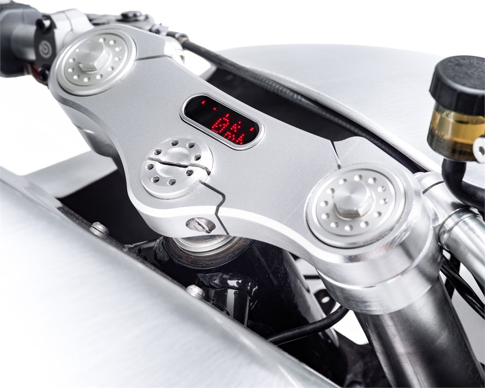 Close-up of the Bandit9 Ducati 821 cockpit with milled aluminum controls and small red display