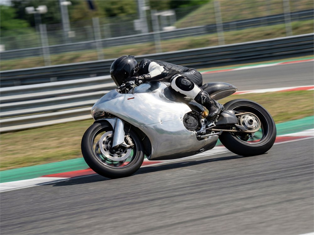 Bandit9 Ducati 821 coachbuilt motorcycle leaning through a racetrack corner