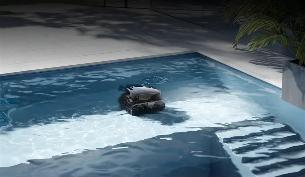Beatbot AquaSense X cleaning a backyard swimming pool