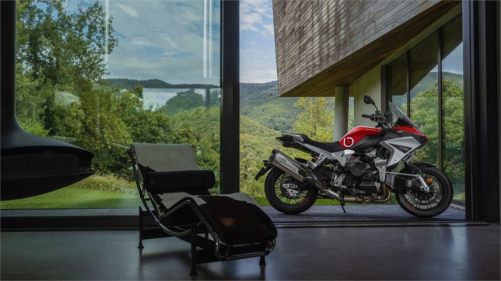 Bimota Tesi H2 Tera parked beside a mountain-view building