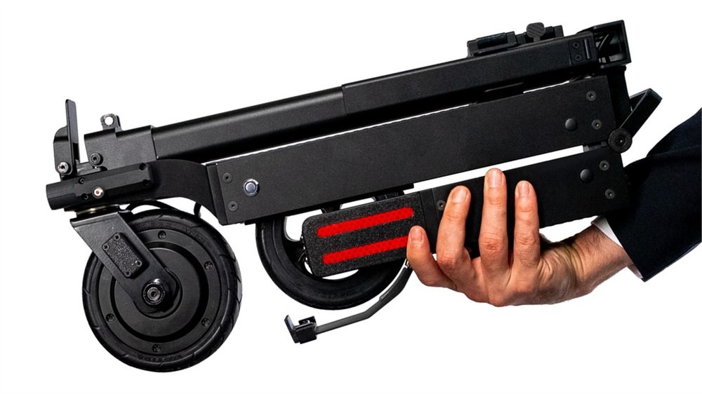 Blizwheel F0.5 folded compact electric scooter held by hand