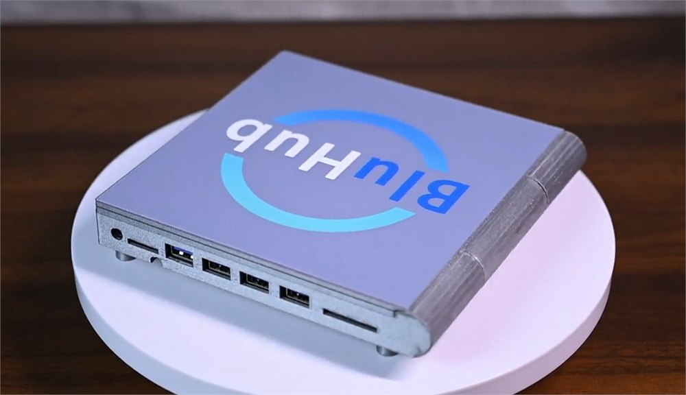 BluHub side view showing the disc tray, USB ports, and card readers