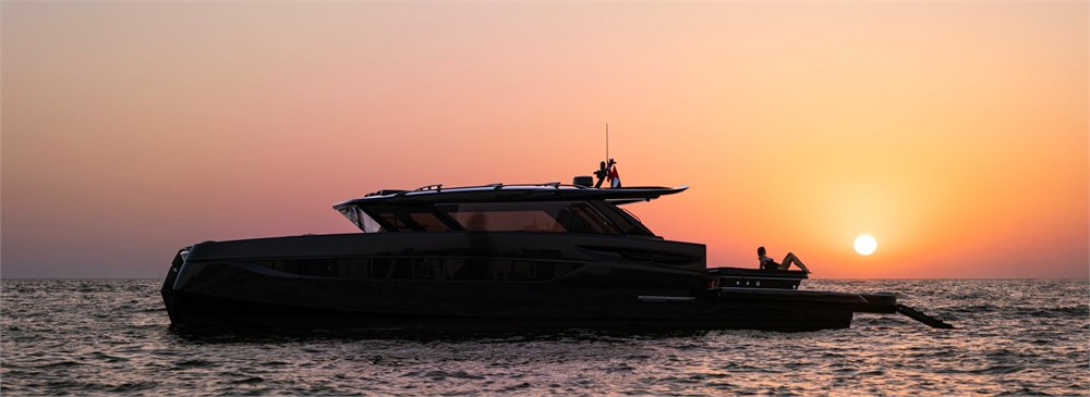 BRABUS ULTIMA 55 dark catamaran profile at sunset
