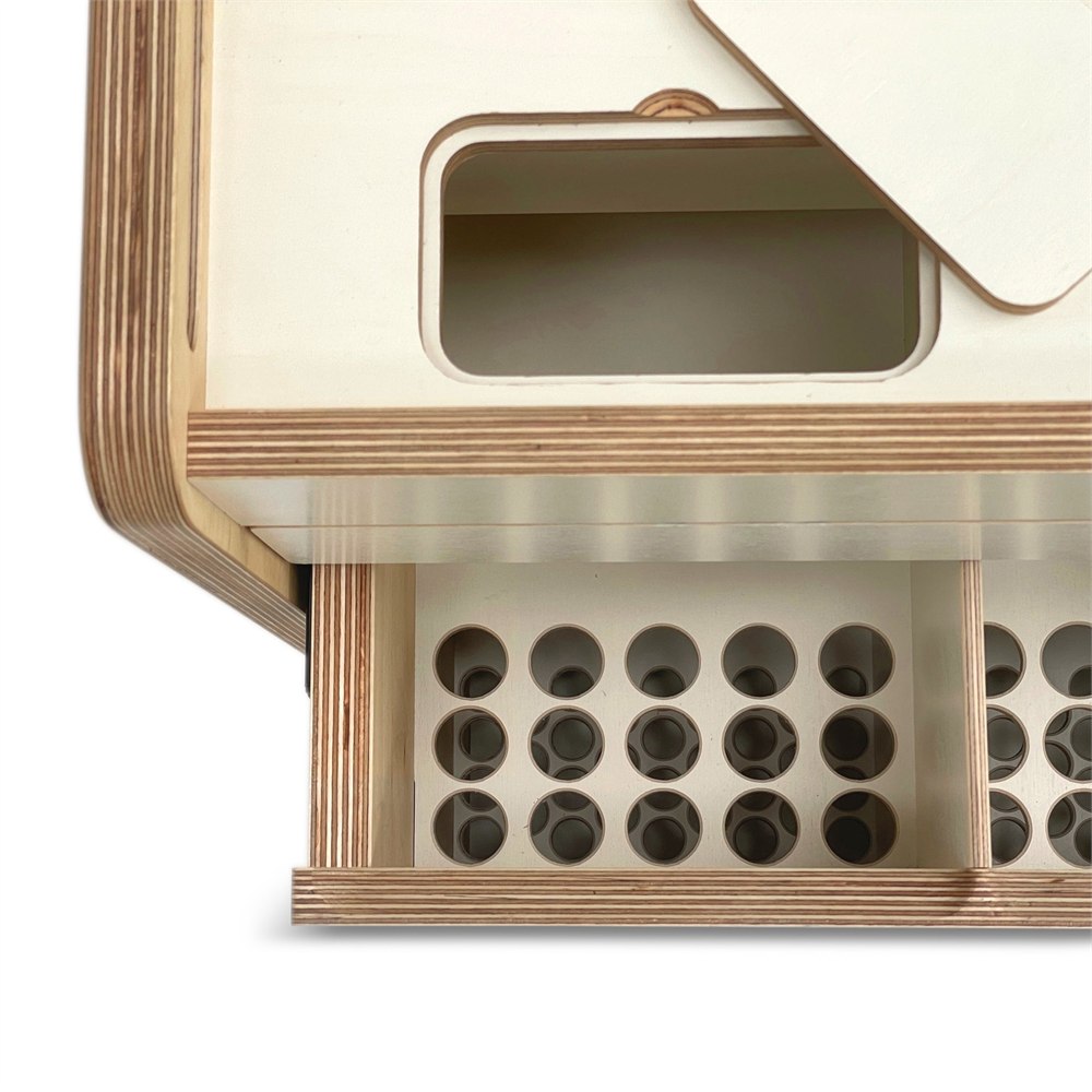 Close view of Brickle wooden LEGO sorting furniture perforated drawer tray