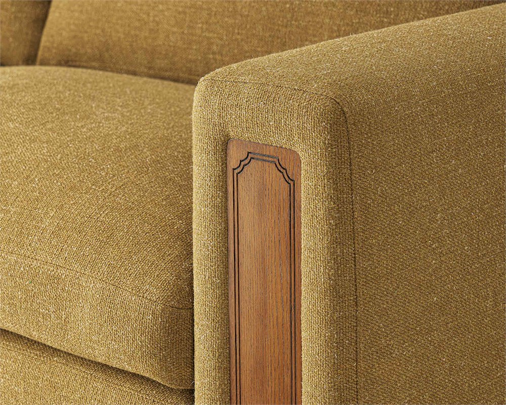 Close-up of the Kagan sofa carved solid oak pillar detail set into the armrest