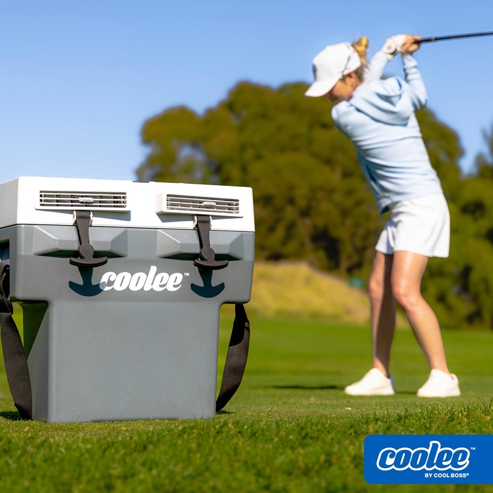 Golfer using a cart equipped with the Coolee Tour LX