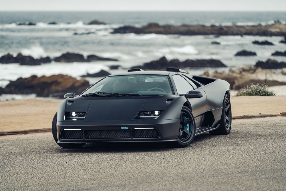 Eccentrica V12 Roadster shown in a dramatic exterior driving setting