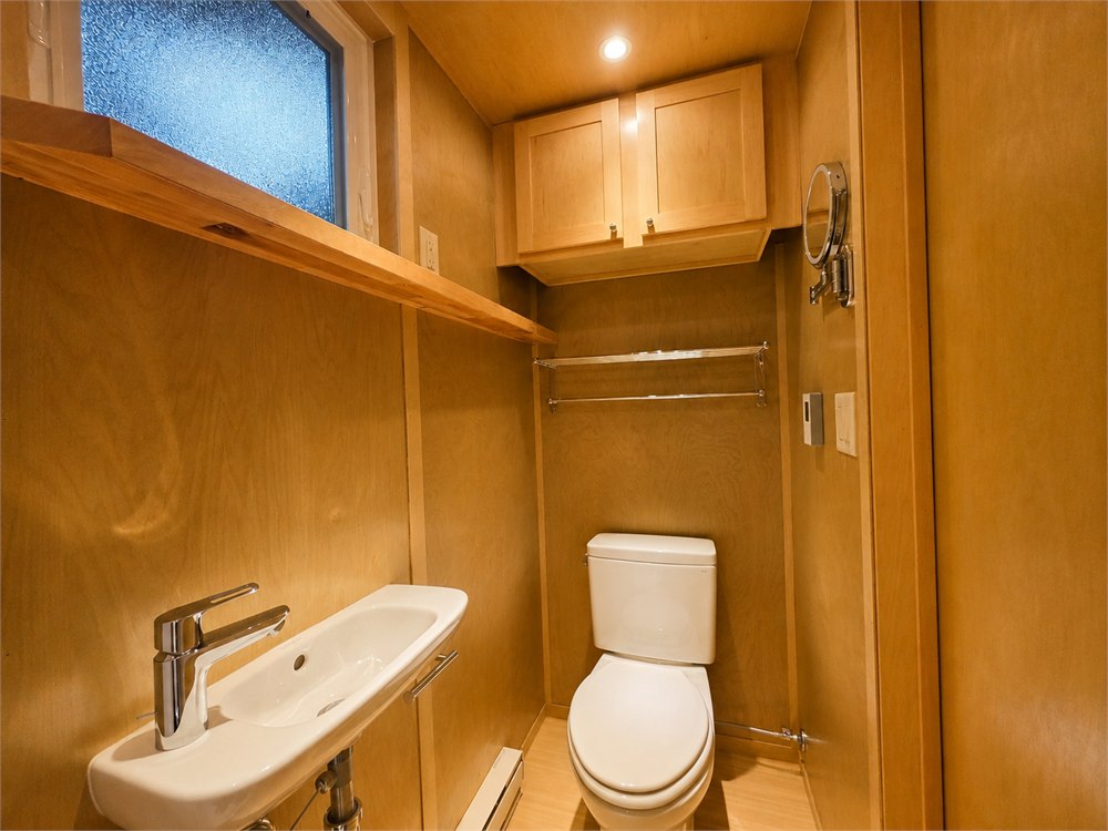 Bathroom sink and flushing toilet inside the Escape eBoho Go