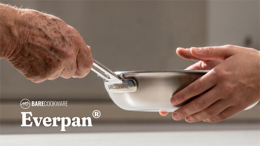 Everpan frying pan being held by its stainless steel handle