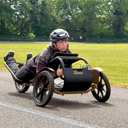 This Face-First Electric Trike Lets You Ride Like A Human Paper Airplane