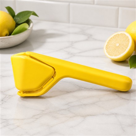 This Fold-Flat Citrus Juicer Squeezes Lemons Then Stores Like A Flat Yellow Secret