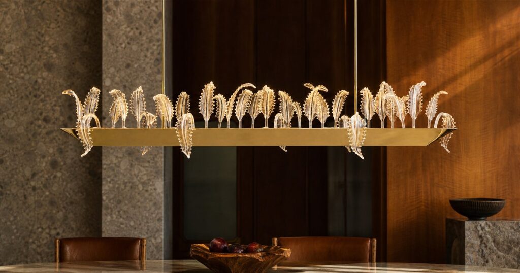Blue Green Works Garden Murano glass lighting collection glowing in a warm interior