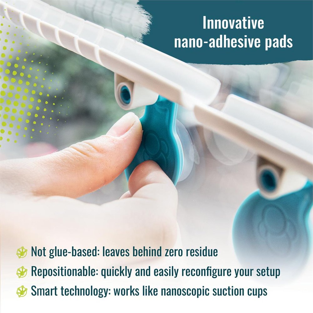 Gecko Run reusable adhesive pads holding track sections in place
