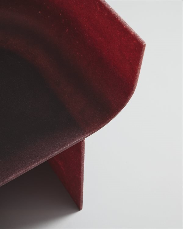 Close detail of the Gallotti and Radice Half-Pipe armchair shell material