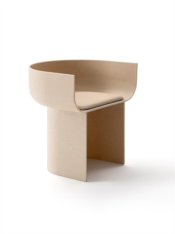 Travertine powder Half-Pipe armchair with leather cushion