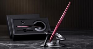 Levitating burgundy Hoverpen Interstellar on its magnetic base