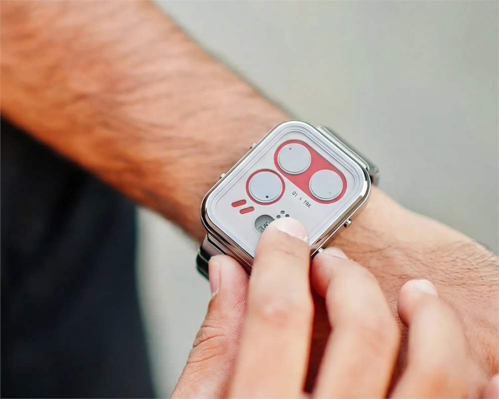 Impossible Watch being adjusted on a wrist