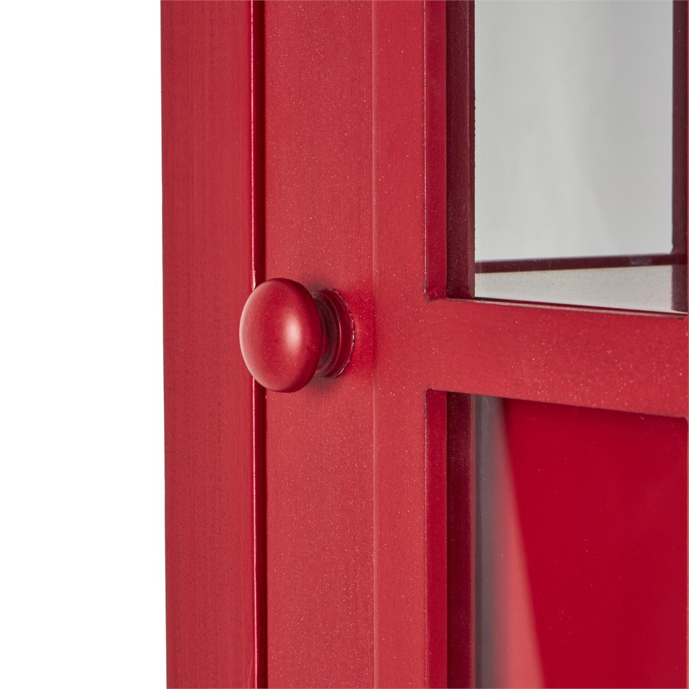 Close-up of the red cabinet door and glass panel detail