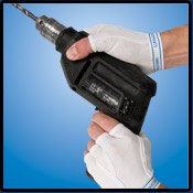 Hands wearing Handerpants while holding a power drill