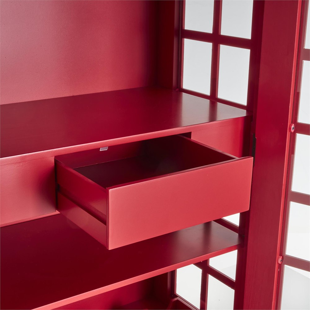 Small red storage drawer inside the telephone booth wine cabinet