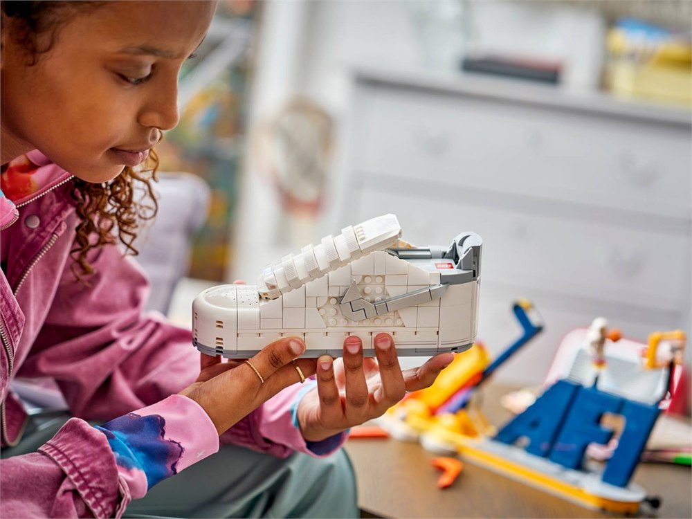 LEGO Air Force 1 sneaker on its rocket-blast display stand