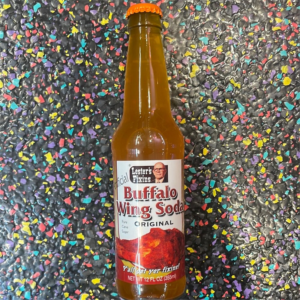 Lesters Fixins Buffalo Wing Soda bottle on colorful background