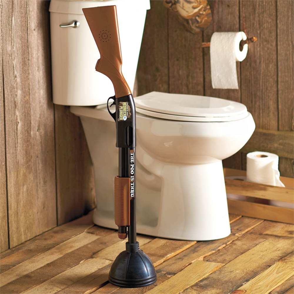 The Redneck Plunger standing beside a toilet in a rustic bathroom