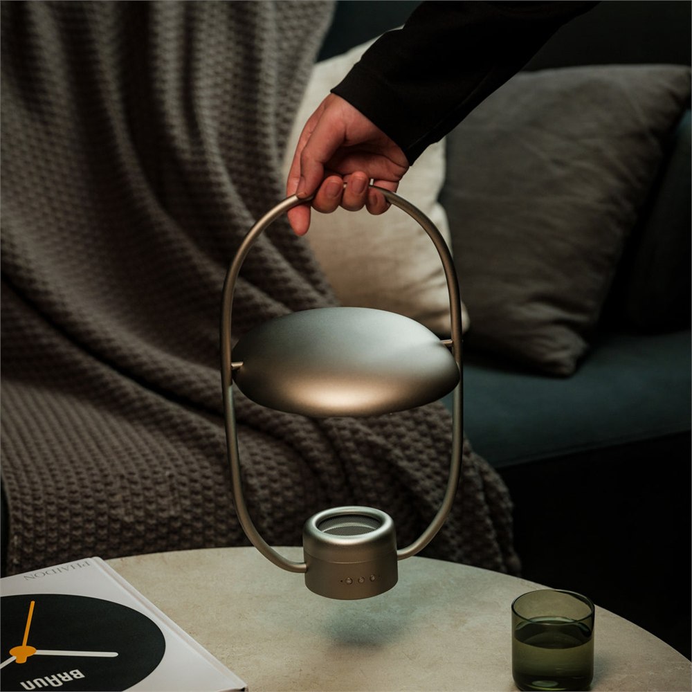 SOL Style luminous mirror diffuser carried as a portable ambient lamp