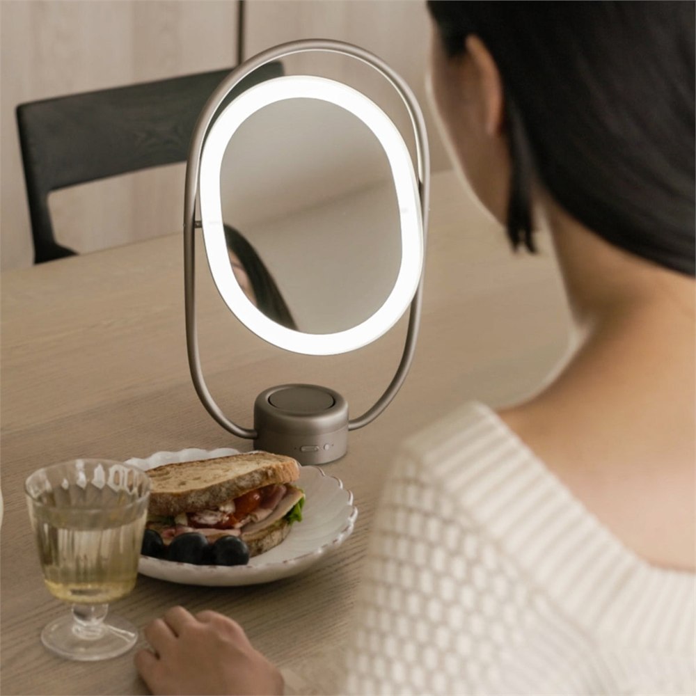 Luminous mirror diffuser used as a lighted vanity mirror near a meal