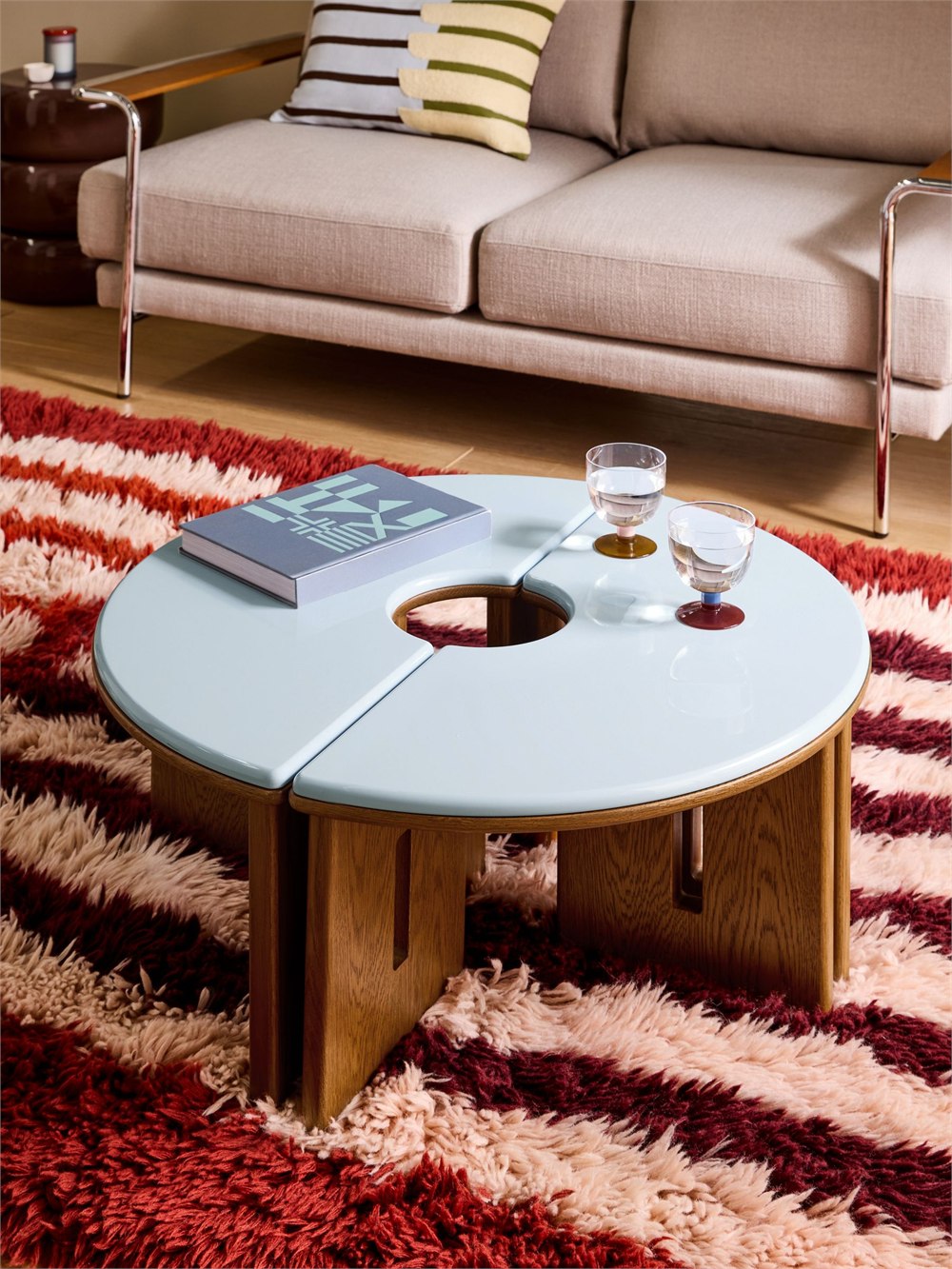 MADE x Barbican Plinth coffee table shown in a living room with blue gloss top and oak base