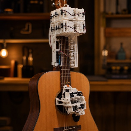 This 3D-Printable Guitar-Playing Robot Turns Tabs Into Real Acoustic Music