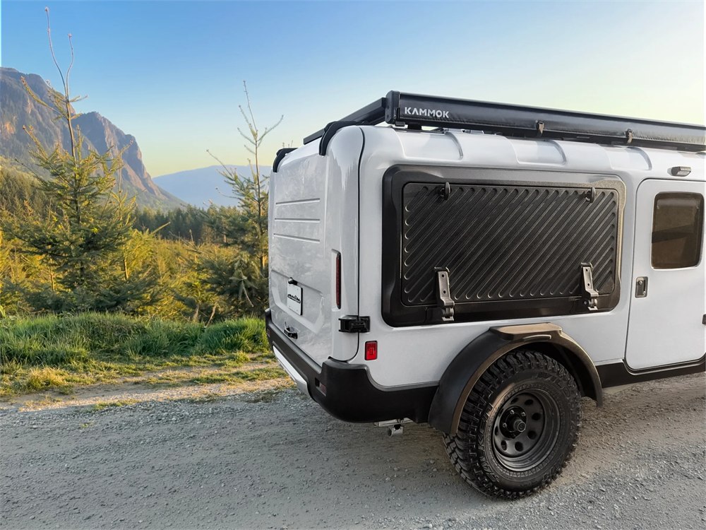 Motsmann Outranger micro-camper at a mountain campsite