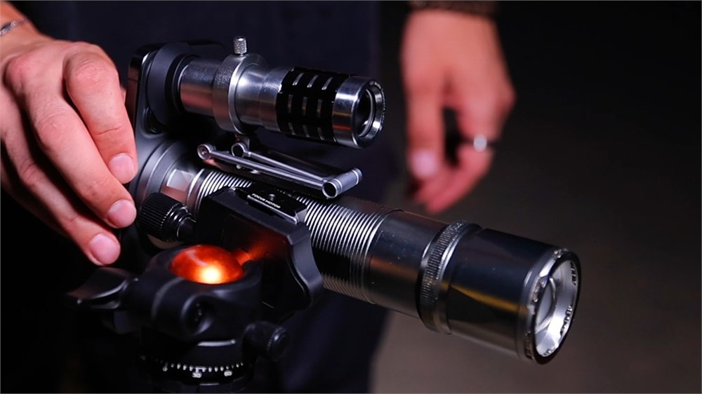 Nivora Apex X mounted on a tripod with phone adapter outdoors