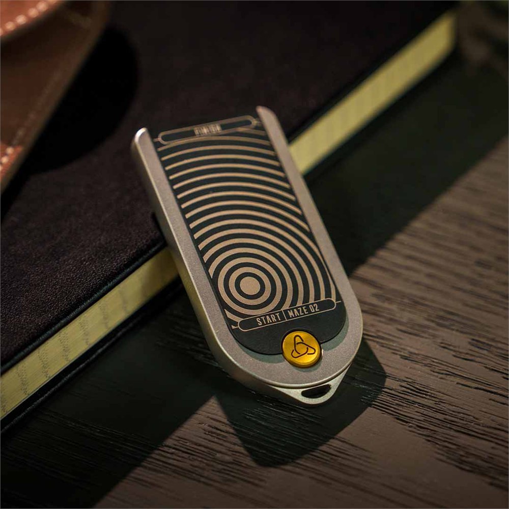 NXT Shift maze cartridge with gold node on a desk