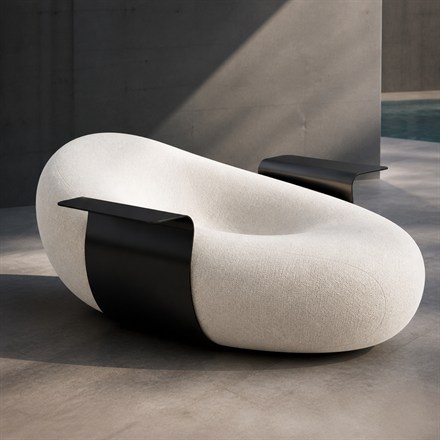 This Sculptural Lounge Chair Wraps a Bean-Shaped Seat in a Metal Side Table