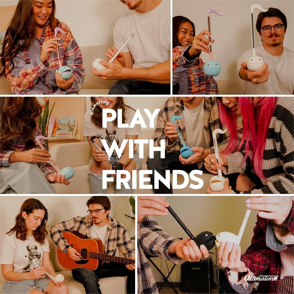 People playing Otamatone musical instruments together