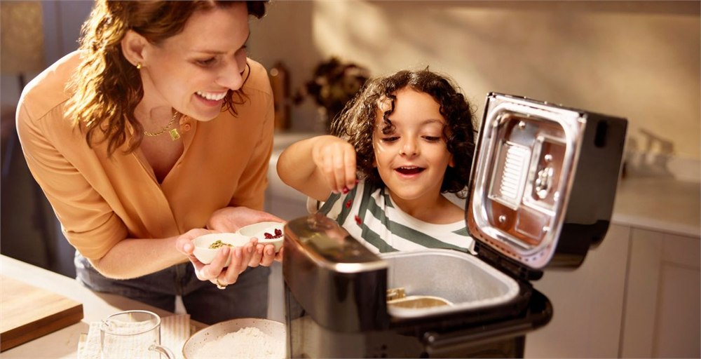 Panasonic SD-PMC100 Mini Bread and Ice Cream Maker open on a kitchen counter