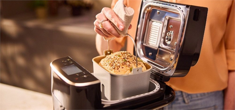 Panasonic SD-PMC100 compact appliance with ingredients and frozen dessert setup