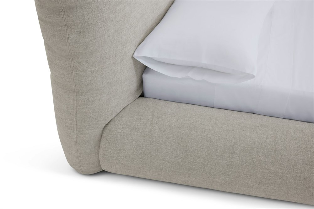 Close detail of the Knoll Perron Pillo Bed cushioned headboard and upholstery