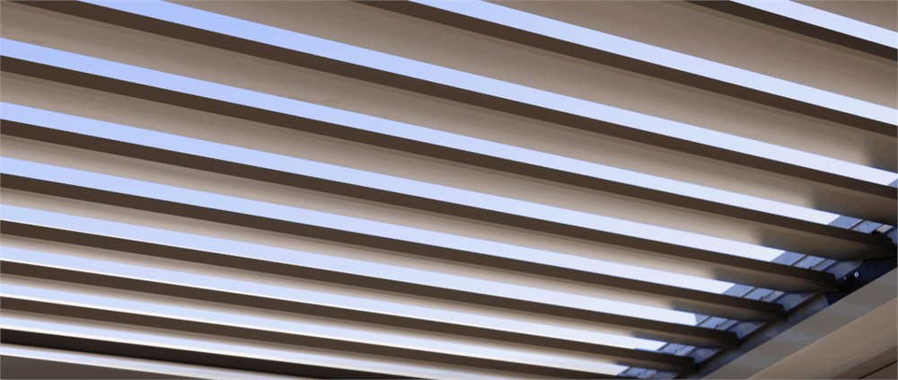 Close view of the StruXure Pivot 6 Flat pergola louvers from below