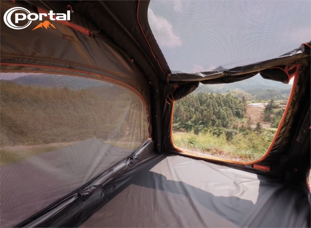 Portal Nomis One inflatable tent shown with black orange fabric and windows