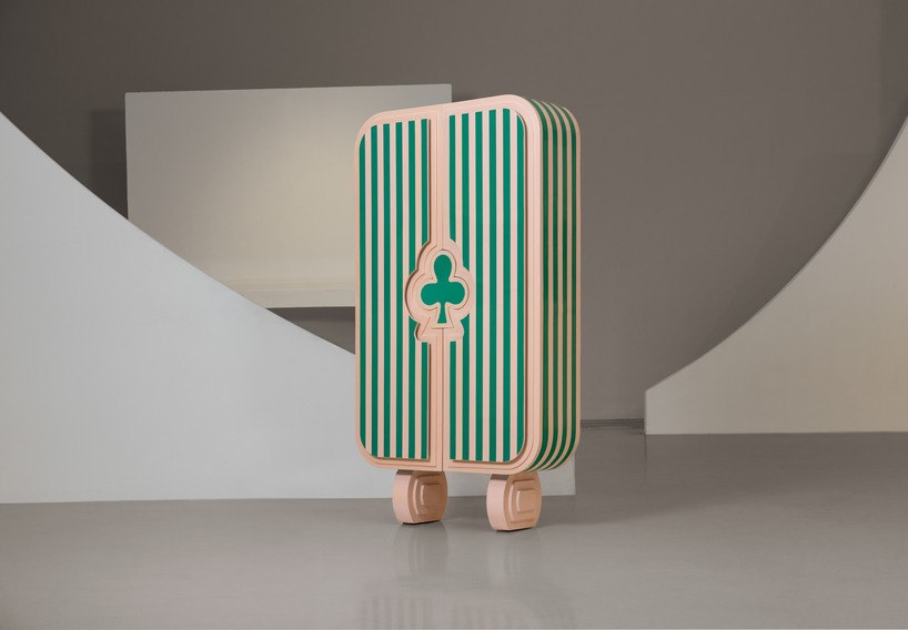 Striped green and cream Ramino cabinet with club-shaped detail