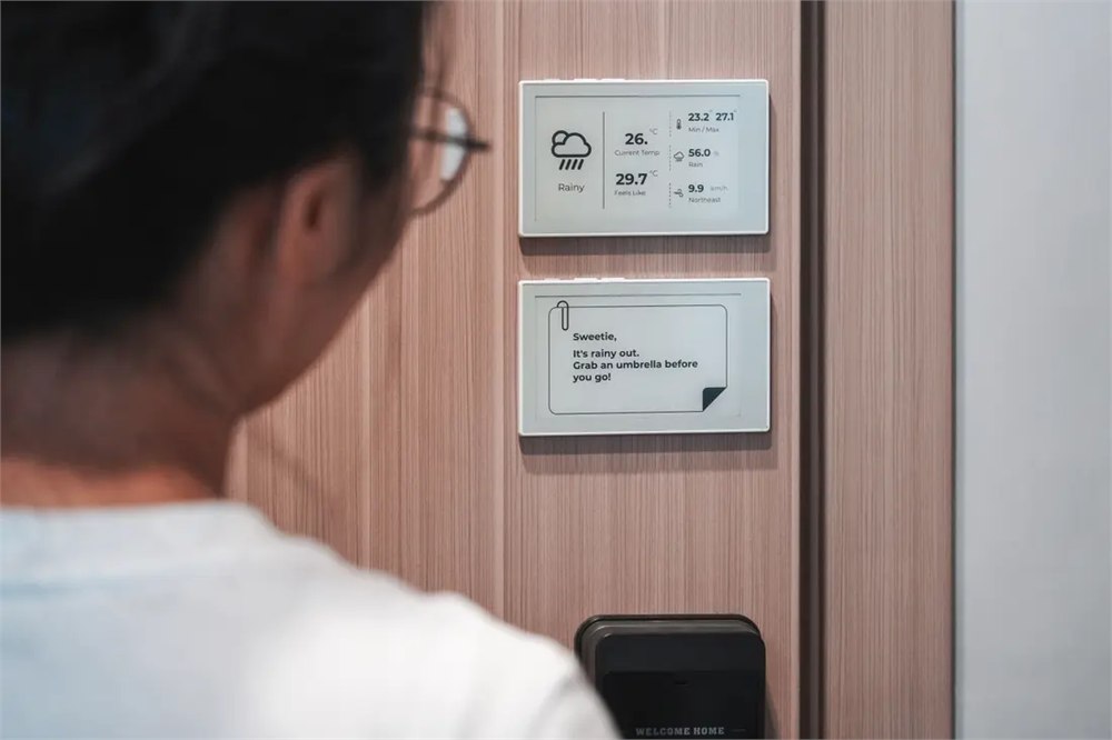reTerminal Sticky showing weather and reminder notes near an entryway