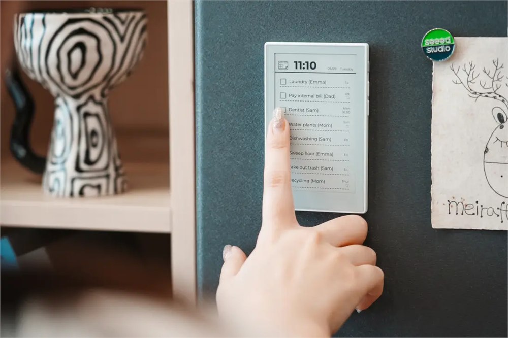 reTerminal Sticky showing a family to-do list on a refrigerator