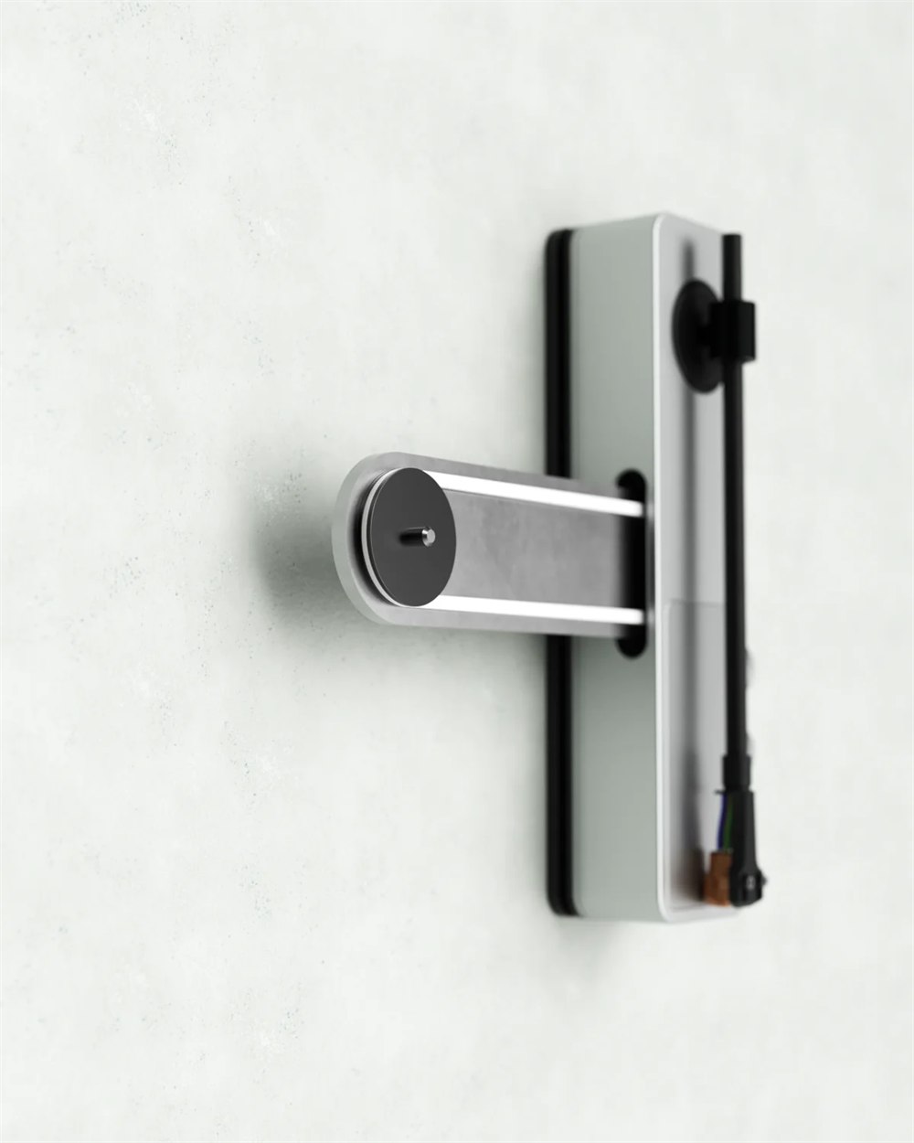 Close detail of the Ruka TD-1 tonearm and vertical turntable body