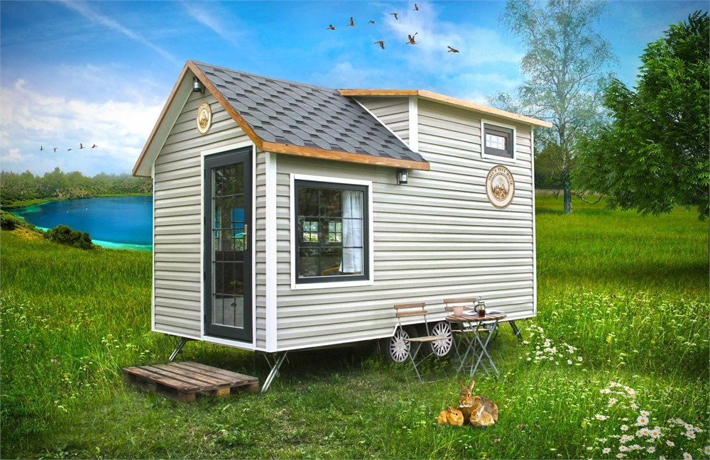 Saly Sunrise Off-Grid Tiny House with white siding and shingle roof