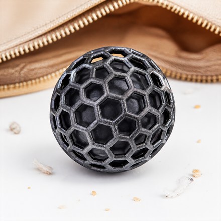 This Reusable Bag Cleaning Ball Rolls Around Collecting Purse Crumbs