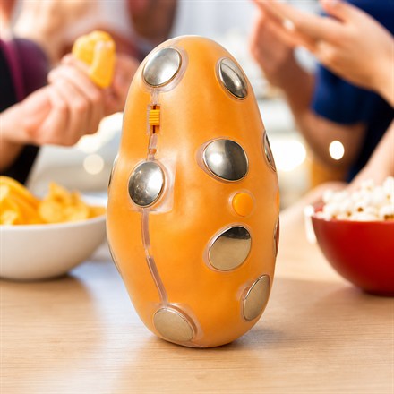 Close-up of Shocktato shocking hot potato party game