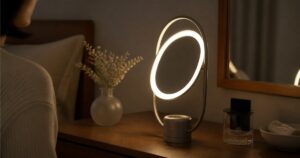 SOL Style 3-in-1 luminous mirror diffuser glowing on a bedside table